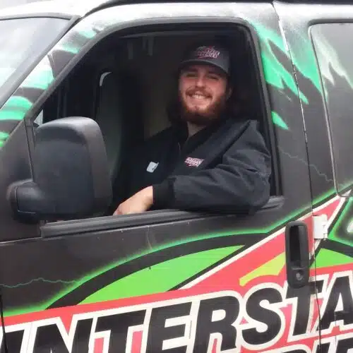 Interstate Battery driver in truck